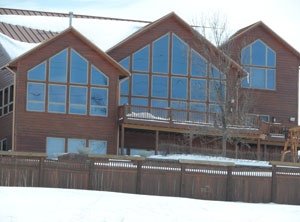 Side windows of a home with window film installed